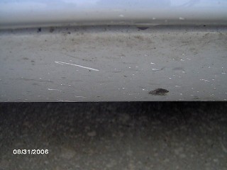 Speeding through debris in an AUDI.