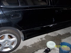  charae's lexus scraped both side doors.